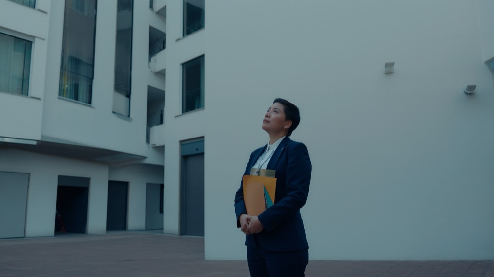 Strata committee reviewing scheme records and compliance documents to check for governance gaps